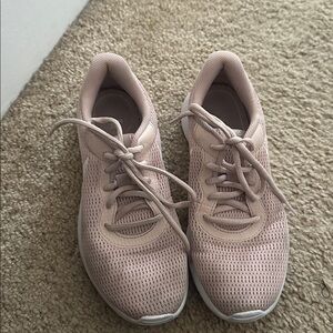 Nike light pink sneakers size 7! Lightly worn.